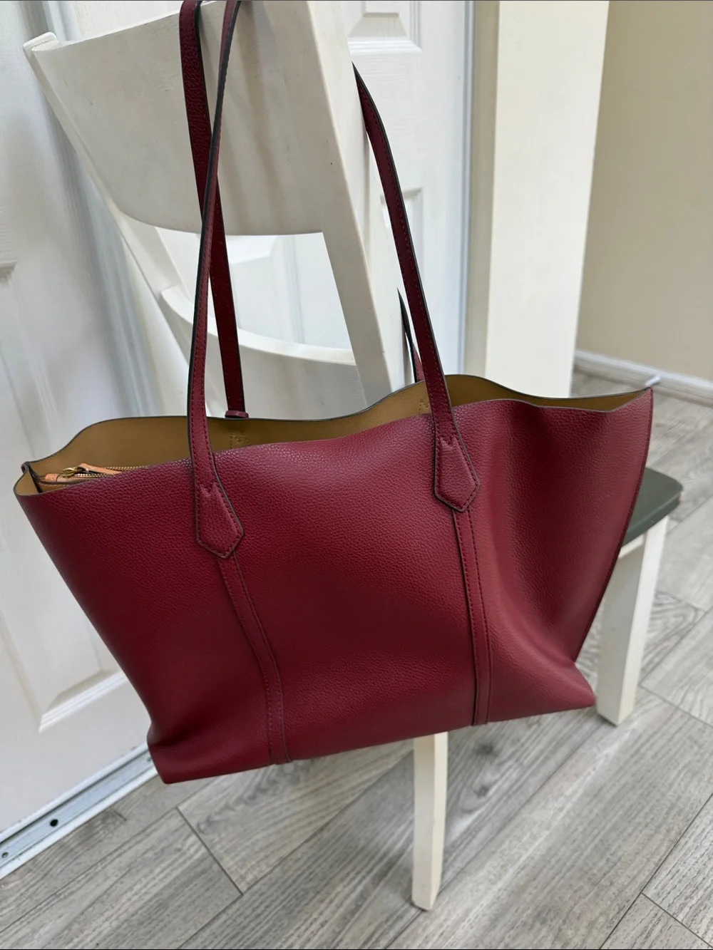 Tory Burch Wine Red Pebbled Leather Tote with Gold Logo Charm